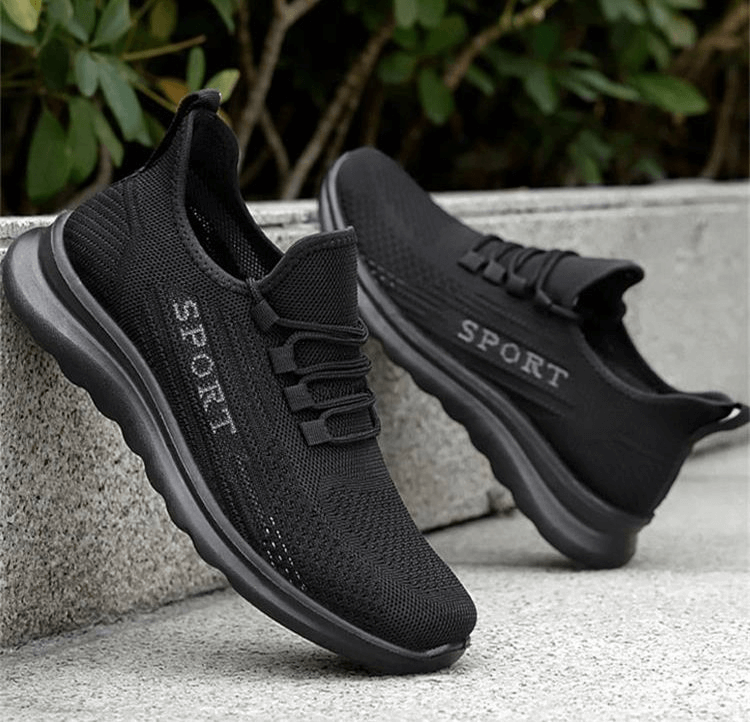 Stylish breathable black lace-up sneakers with mesh upper and PU insole, perfect for men's casual fashion and all-day comfort.